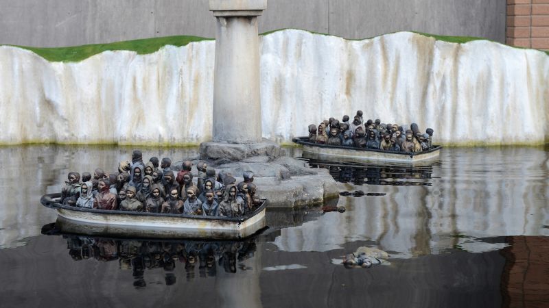 Banksy is raffling Dismaland's refugee boat for a good cause | CNN