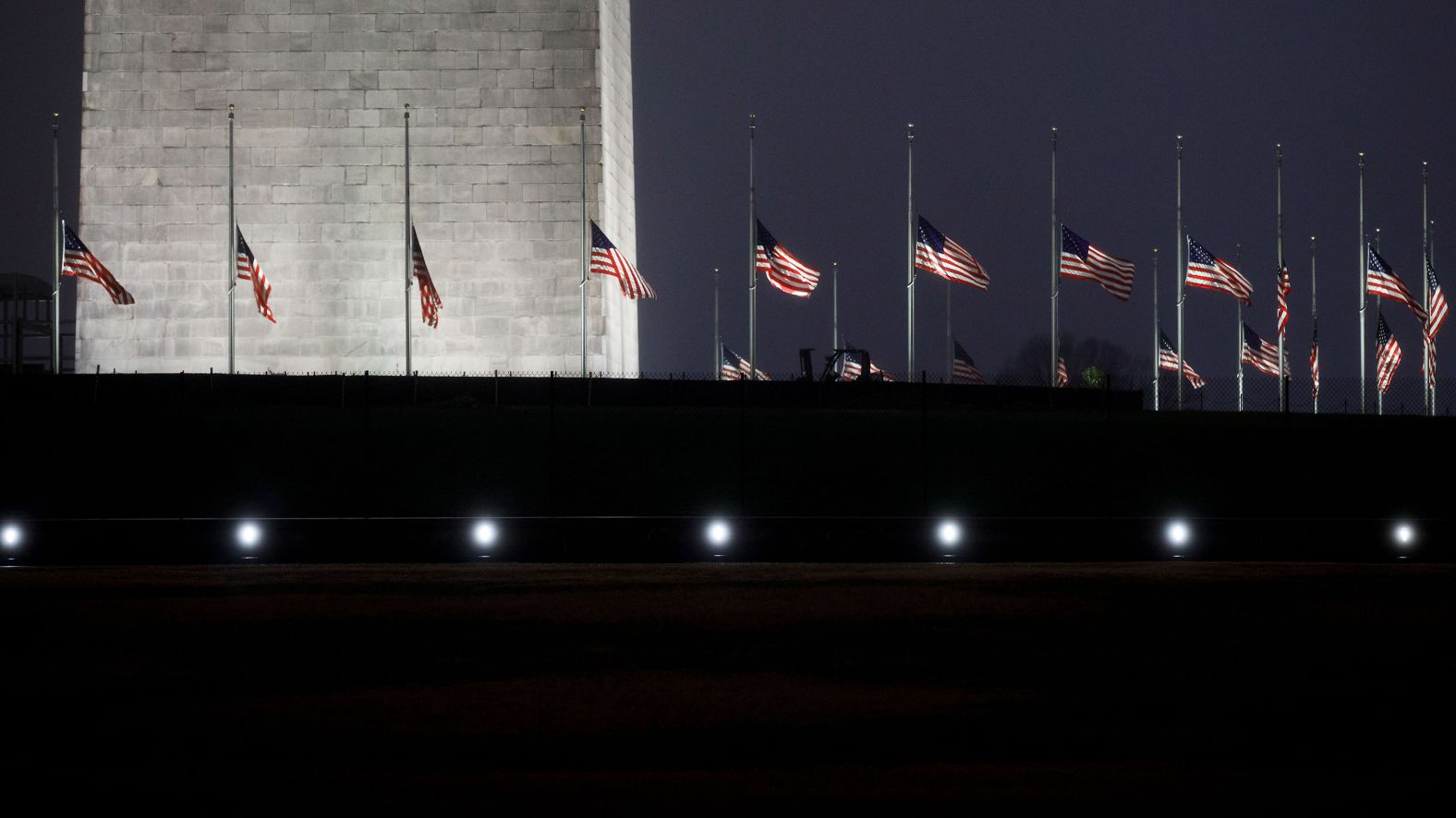 Flags at the Washington Monument fly at half-staff to pay tribute to Bush on Saturday, December 1.