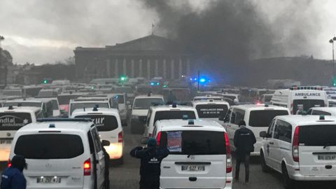 Paramedics join anti-government protests outside the National Assembly in Paris.