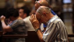 NEW YORK, NY - SEPTEMBER 08:  A man prays during mass at St. Patrick's Cathedral, the seat of the Roman Catholic Archdiocese of New York, on September 8, 2015 in New York City. Just in time for the arrival of Pope Francis later this month to hold mass at the church, a three-year restoration project at St. Patrick's is largely completed. The project at one of America's most popular churches cleaned the exterior of the church, repaired panels and stained glass windows and restored the large bronze doors at the Fifth Avenue entrance. St. Patrick's held its first Mass in 1879.  (Photo by Spencer Platt/Getty Images)