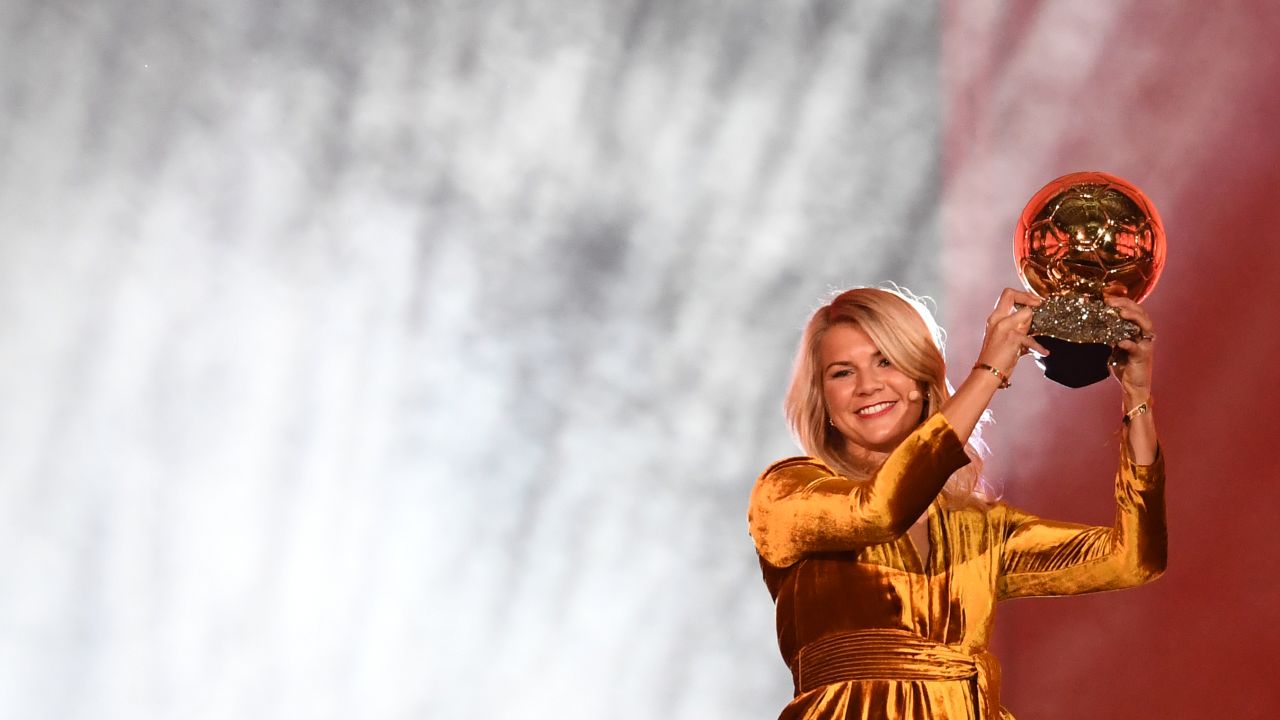 Hegerberg holds aloft her Balon d'Or, received in Paris last December. 
