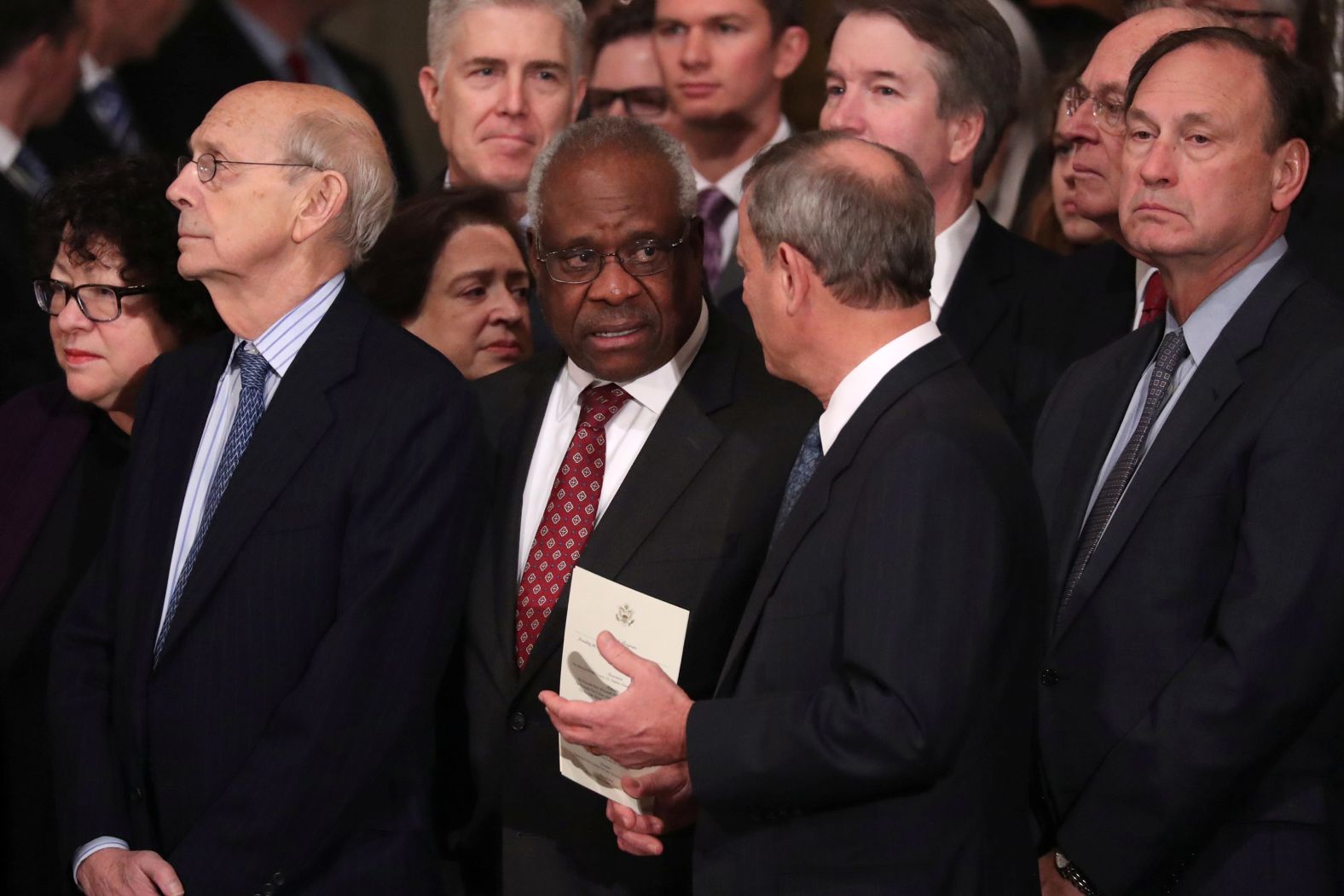 Supreme Court justices await the casket's arrival on December 3.