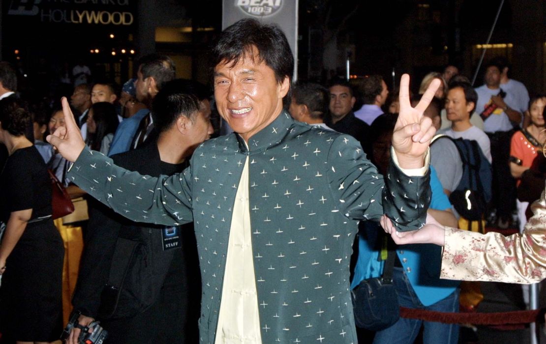  Actor Jackie Chan poses for photographers during the world premiere of the film "Rush Hour 2" at the Mann's Chinese Theatre in 2001 in Los Angeles.