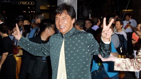  Actor Jackie Chan poses for photographers during the world premiere of the film "Rush Hour 2" at the Mann's Chinese Theatre in 2001 in Los Angeles.