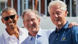 JERSEY CITY, NJ - SEPTEMBER 28:  Presidents Obama, G.W. Bush, and Bill Clinton smile while on the first tee during the first round of the Presidents Cup at Liberty National Golf Club on September 28, 2017 in Jersey City, New Jersey. (Photo by Shelley Lipton/Icon Sportswire via Getty Images)