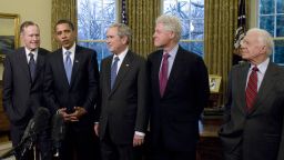 FILE: U.S. President George W. Bush, center, meets with U.S. President-elect Barack Obama, second from left, and former U.S. Presidents George H.W. Bush, far left, Bill Clinton, second right, and Jimmy Carter in the Oval Office of the White House in Washington, D.C., U.S., on Wednesday, Jan. 7, 2009. George H.W. Bush, the U.S. president who fashioned a restrained response to the Soviet Unions collapse and assembled the multinational coalition that liberated Kuwait from an Iraqi invasion, hoping that would be a model for a new world order, has died. He was 94. Photographer: Ron Sachs/Pool via Bloomberg
