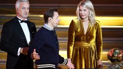 Olympique Lyonnais' Norwegian forward Ada Hegerberg (R) looks on next to French former player and presenter David Ginola and French DJ and co-host Martin Solveig (C) after receiving the women's 2018  Women's Ballon d'Or award for best player of the year during the 2018 Ballon d'Or award ceremony at the Grand Palais in Paris on December 3, 2018. (Photo by FRANCK FIFE / AFP)        (Photo credit should read FRANCK FIFE/AFP/Getty Images)