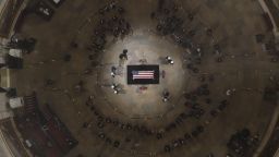 WASHINGTON, DC - DECEMBER 5:   The flag-draped casket of the late former President George H.W. Bush as he lies in state in the Capitol Rotunda on December 5, 2018 in Washington, DC. 