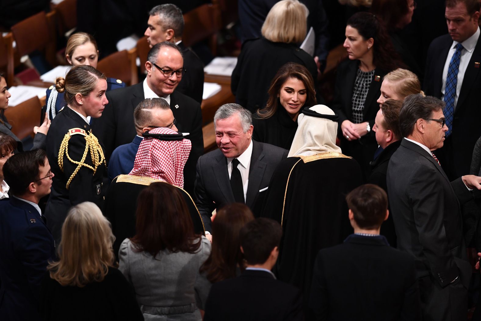 Jordan's King Abdullah II and Queen Rania arrive before the funeral.