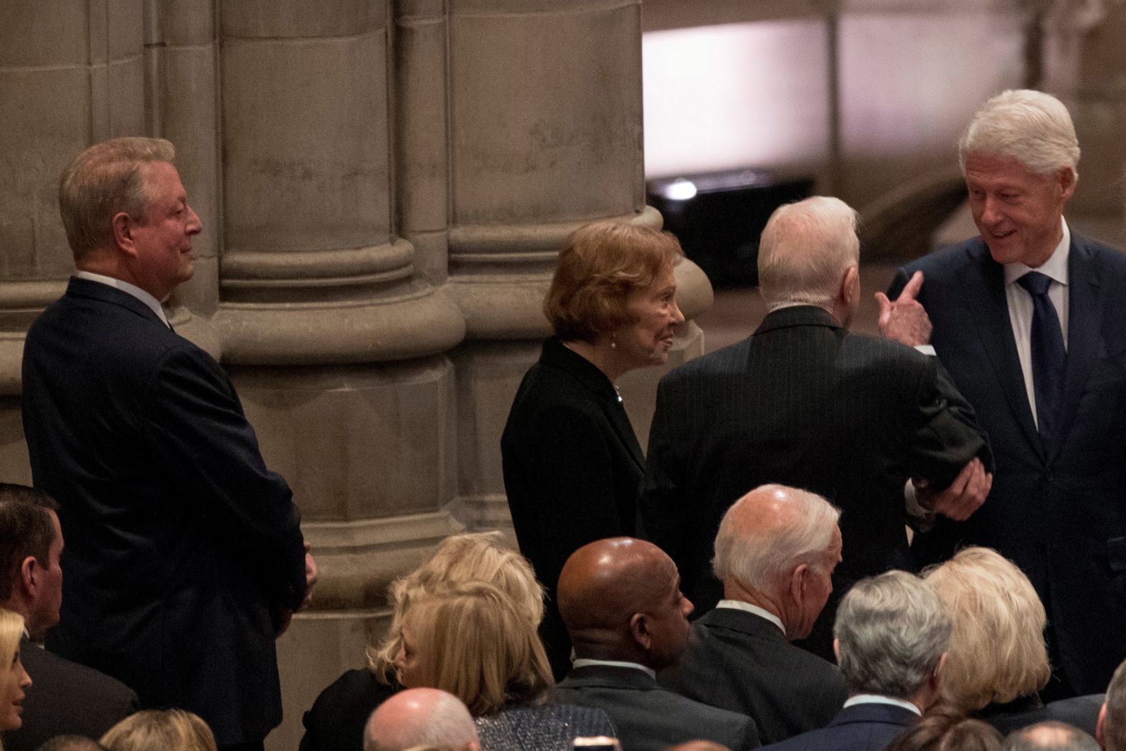 Former Vice President Al Gore, left, looks on as former President Jimmy Carter and former first lady Rosalynn Carter speaks with former President Bill Clinton before the state funeral.