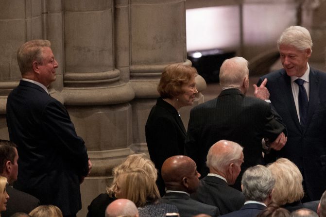 Former Vice President Al Gore, left, looks on as former President Jimmy Carter and former first lady Rosalynn Carter speaks with former President Bill Clinton before the state funeral.