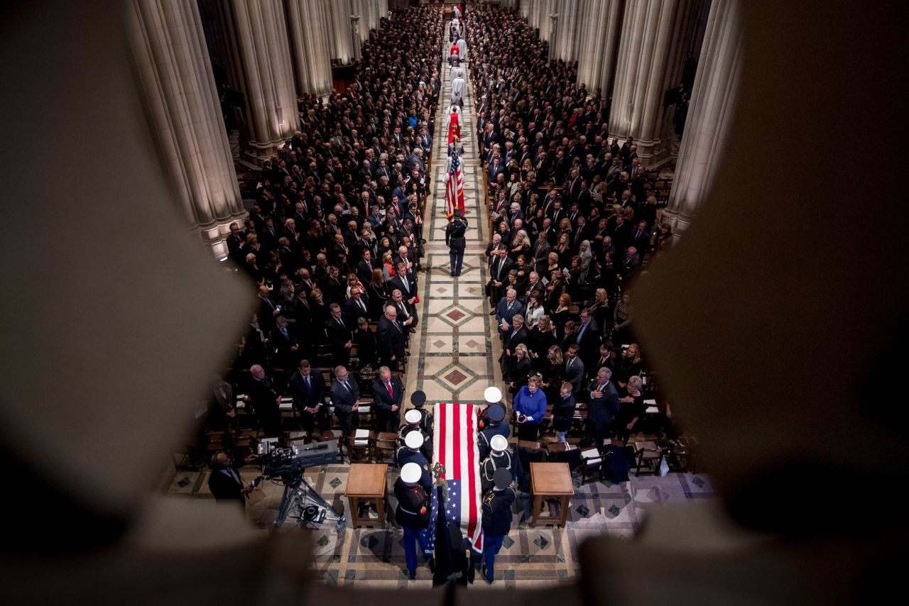 Bush's casket is carried at the National Cathedral.