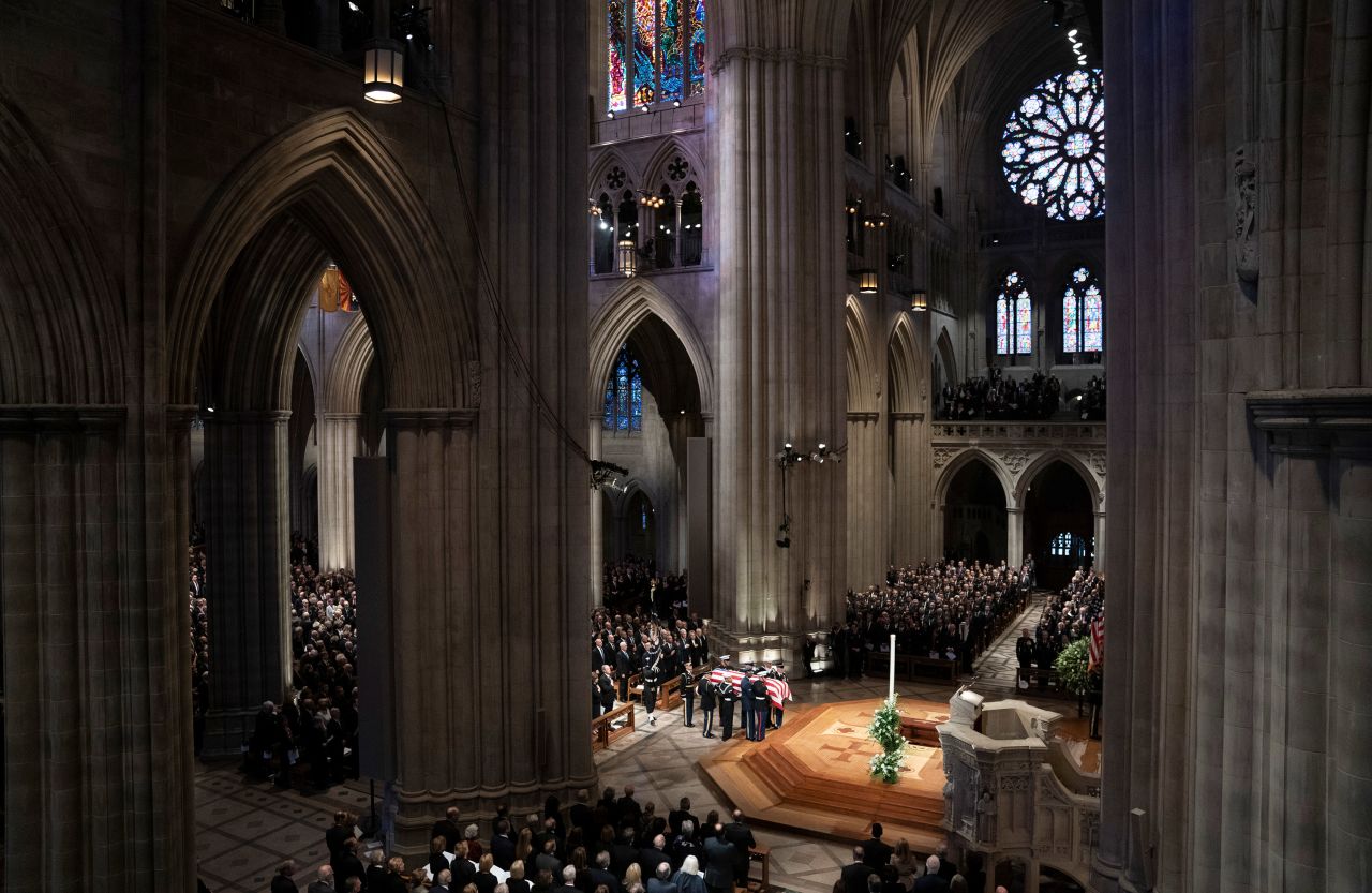 The late President's casket arrives at the National Cathedral in Washington.