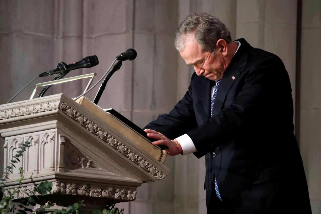 George W. Bush speaks at his father's state funeral on December 5. "He showed me what it means to be a President who serves with integrity, leads with courage and acts with love in his heart for the citizens of our country," Bush said in his eulogy. "When the history books are written, they will say that George H.W. Bush was a great President of the United States."