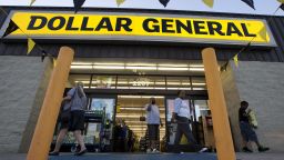 FILE - In this Wednesday, Sept. 25, 2013, file photo, customers exit a Dollar General store in San Antonio. Dollar General Corporation reports financial results, Thursday, Dec. 1, 2016. (AP Photo/Eric Gay, File)