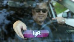 SAN FRANCISCO, CA - JANUARY 31:  A Lyft driver places the Amp on his dashboard on January 31, 2017 in San Francisco, California.  (Photo by Kelly Sullivan/Getty Images for Lyft)