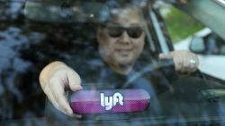SAN FRANCISCO, CA - JANUARY 31: A Lyft driver places the Amp on his dashboard on January 31, 2017 in San Francisco, California. (Photo by Kelly Sullivan/Getty Images for Lyft)