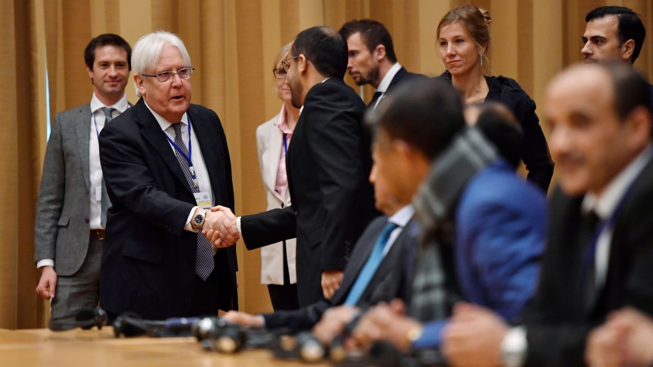 UN Special Envoy to Yemen Martin Griffiths shakes hands with Yemeni delegates during the opening press conference of the Yemeni peace talks at Johannesberg castle in Rimbo, Sweden.