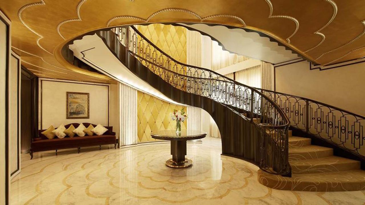 The two-story 11,600-square-foot suite includes a spiral staircase, a cinema and private library.