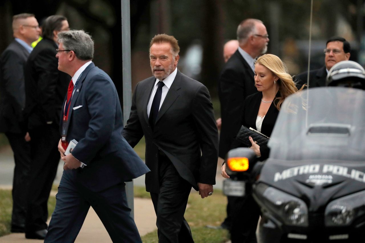 Former California Gov. Arnold Schwarzenegger arrives at Bush's funeral in Houston.