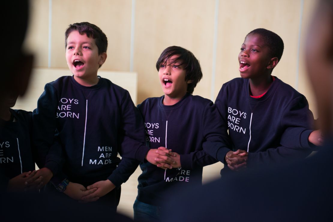 Manhood Academy boys chant the program's mantra, "Boys are born! Men are made!" at the beginning of a session in October.