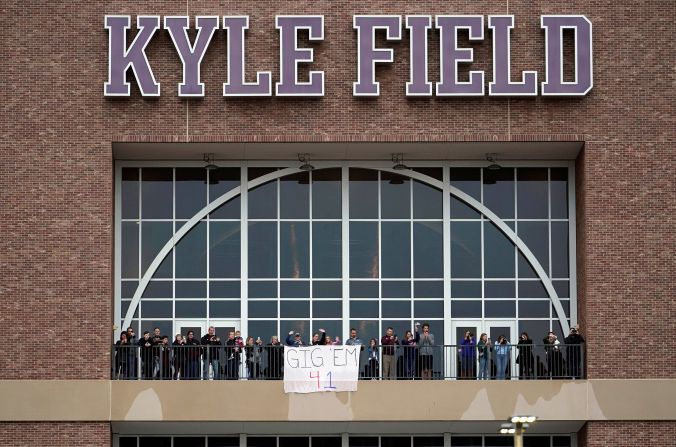 People pay their respects from Texas A&M's Kyle Field.