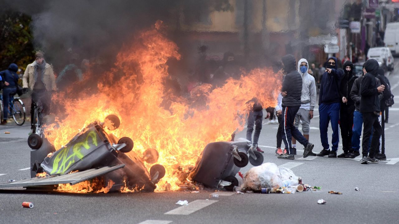 A fire blazes on the Pont Neuf, in Toulouse in December 2018 in a gilets jaunes protest.