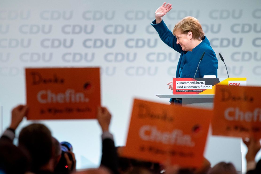German Chancellor Angela Merkel reacts after her last speech as CDU leader.