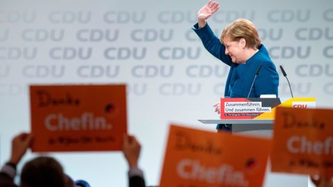 German Chancellor Angela Merkel reacts after her last speech as CDU leader.