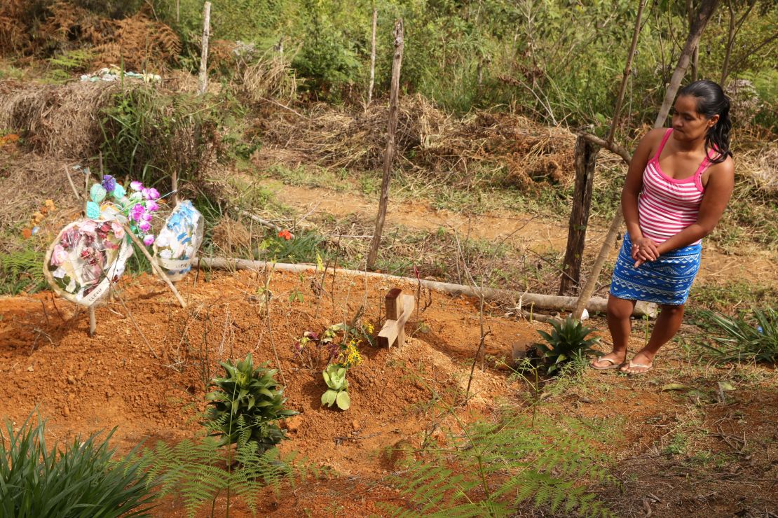 Delmi Amparo Hernández buried her husband in the earth he used to till.