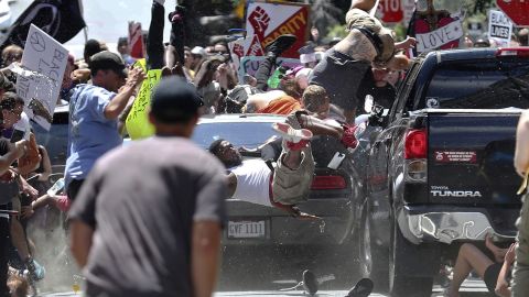 Pedestrians fly into the air after James Fields drives into a crowd of people protesting against the "Unite the Right" white nationalist rally in August 2017.