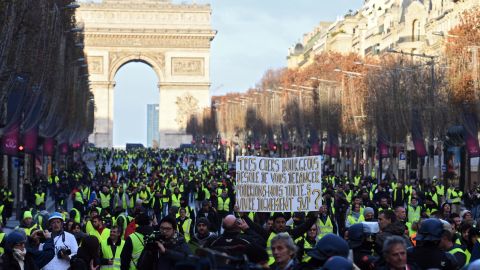 Protesters gather near the Arc de Triomphe Saturday in the French capital.