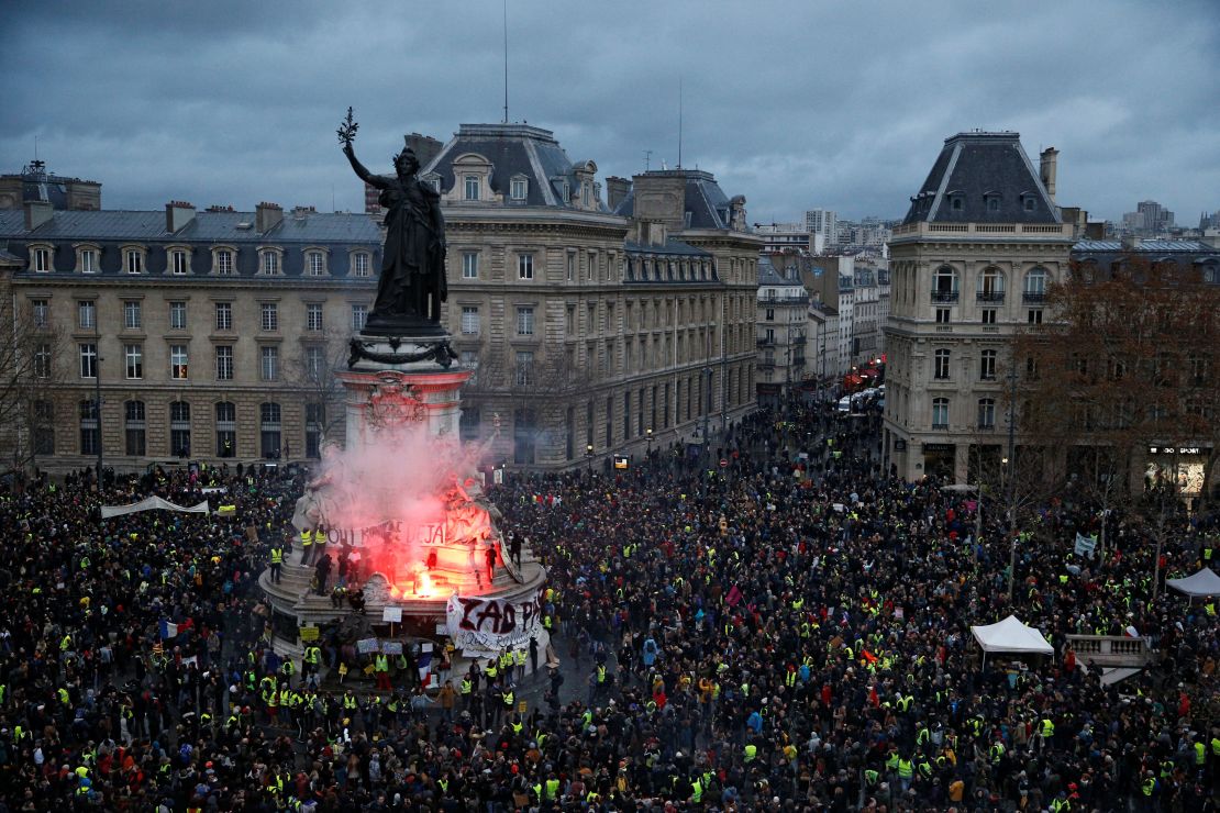 Protesters gather in the Place de la Republique on December 8.