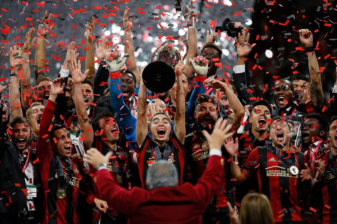 Atlanta United celebrates with the MLS Cup after their 2-0 win over the Portland Timbers at Mercedes-Benz Stadium.