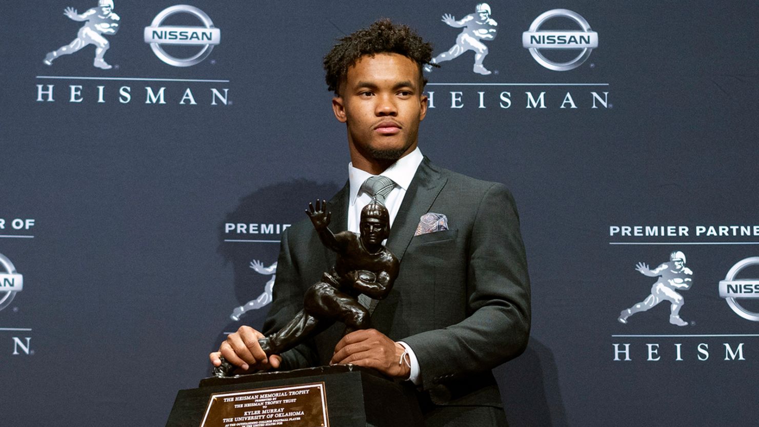Oklahoma quarterback Kyler Murray poses with the Heisman Trophy on Saturday  in New York.