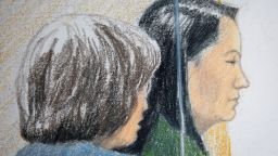 Huawei CFO Meng Wanzhou, who was arrested on an extradition warrant, appears at her B.C. Supreme Court bail hearing along with a translator, in a drawing in Vancouver, British Columbia, Canada December 7.