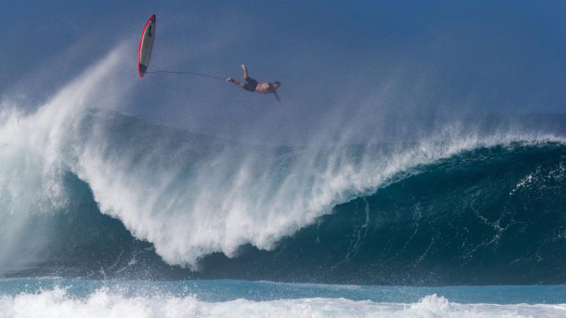 Hawaii's pro surfer Kalani Chapman wipes out while surfing Banzai Pipeline ahead of the Billabong Pipe Masters on the north shore of Oahu in Hawaii on Thursday, December 6.