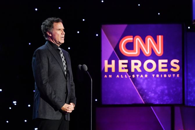Comedian Will Ferrell presents an award to Top 10 CNN Hero Maria Rose Belding.
