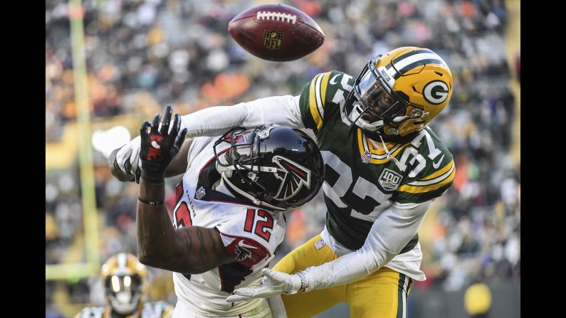 Green Bay Packers cornerback Josh Jackson knocks a pass away from Atlanta Falcons wide receiver Mohamed Sanu in the fourth quarter at Lambeau Field in Green Bay, Wisconsin, on Sunday, December 9.
