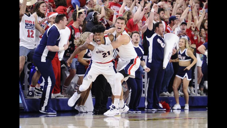 Rui Hachimura and Corey Kispert of the Gonzaga Bulldogs celebrate during a basketball game against the Washington Huskies on Wednesday, December 5 in Spokane, Washington. The Bulldogs won 81-79. 