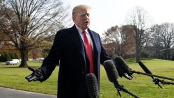 US President Donald Trump answers questions from the press while departing the White House December 8, 2018 in Washington, DC.