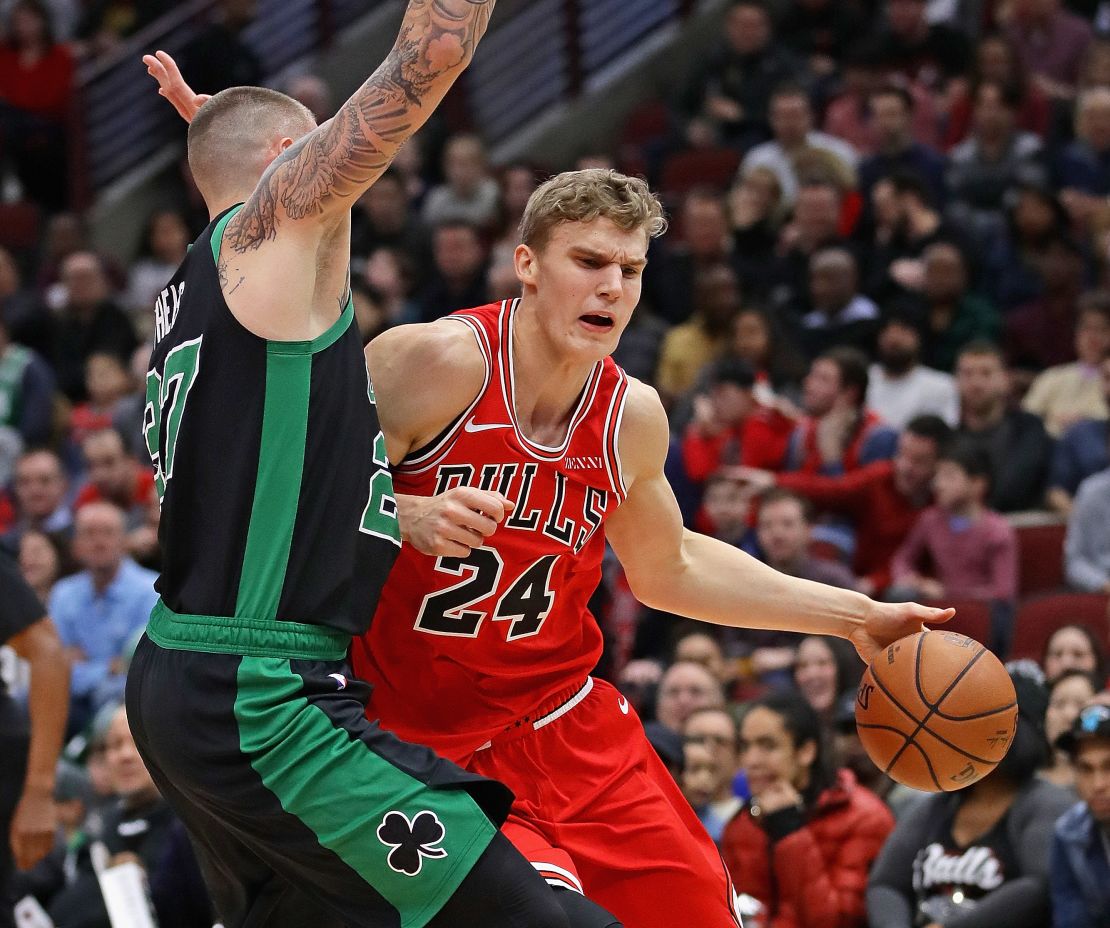 Chicago's Lauri Markkanen moves against the Celtics' Daniel Theis.