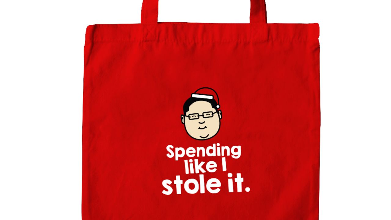 Detail of a tote bag, showing a caricature of Jho Low, the on-the-run financier accused of embezzling billions of dollars from Malaysia's sovereign wealth fund.