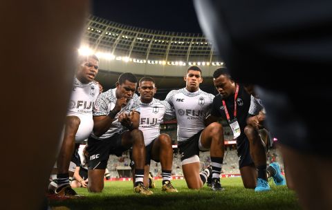 Fijian players huddle after defeating USA to record their first win of the season in Cape Town. 