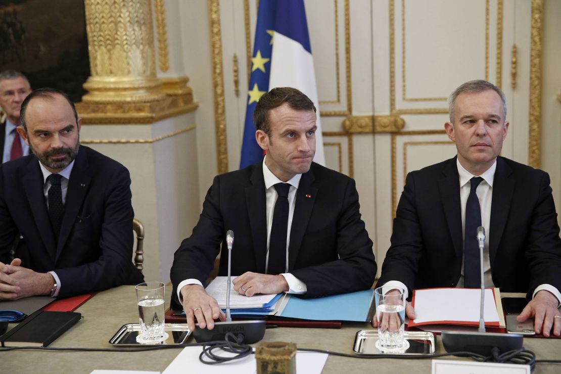 Prime Minister Edouard Philippe, President Emmanuel Macron and Ecology Minister François de Rugy meet with trade union leaders on Monday.