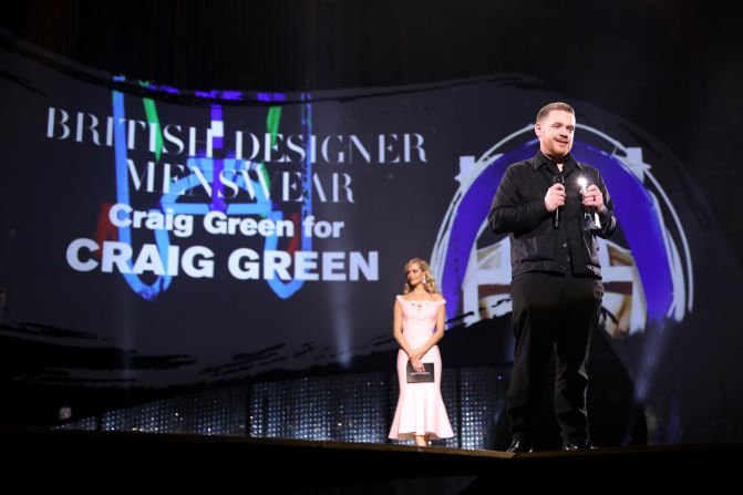 Poppy Delevingne presents the British Designer Of The Year Menswear award to Craig Green.