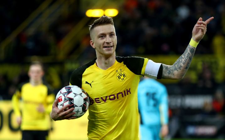 Marco Reus celebrates after scoring for Borussia Dortmund against Freiburg at Signal Iduna Park.