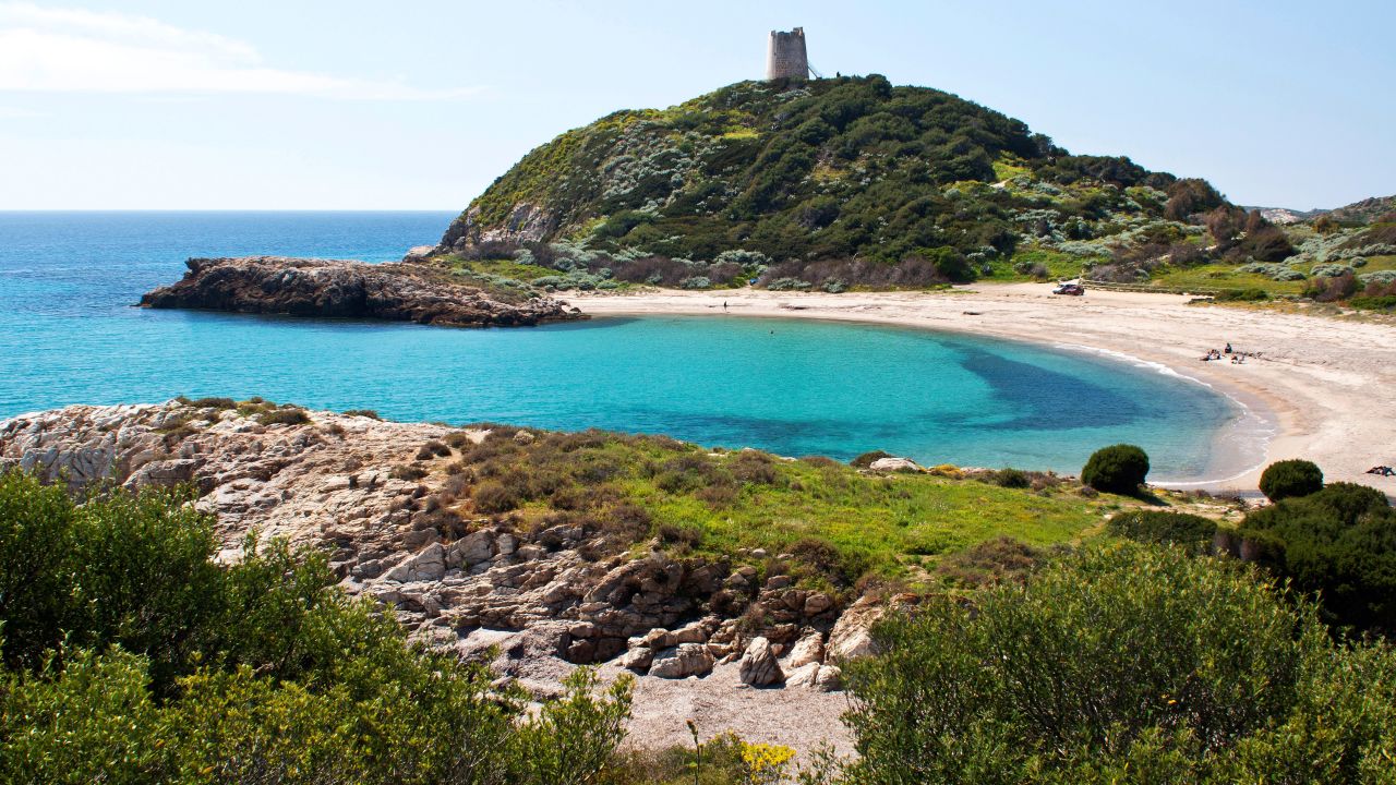 <strong>Chia, Sardinia, Italy:</strong> Its top selling point is that it's positioned in front of a lagoon that serves as a flamingo breeding ground, meaning you can spot flamingos in the distance (and dolphins occasionally) as you soak up the sun.