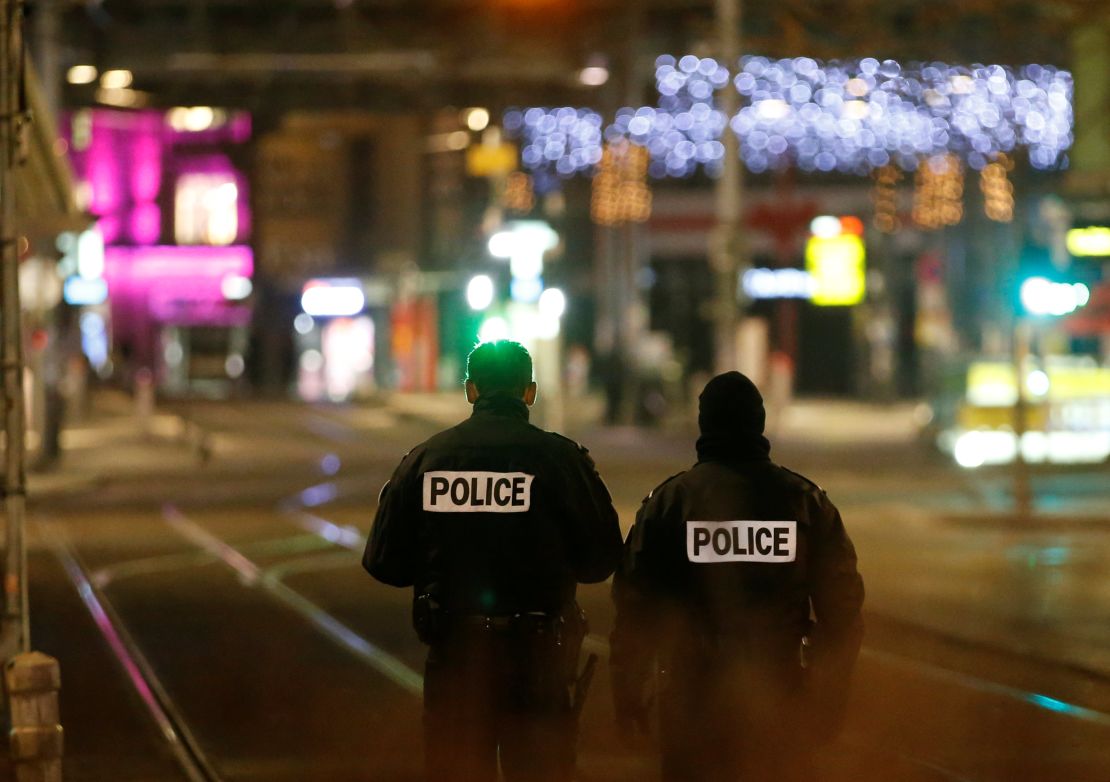 Police secure a street and the surrounding area after a shooting in Strasbourg.