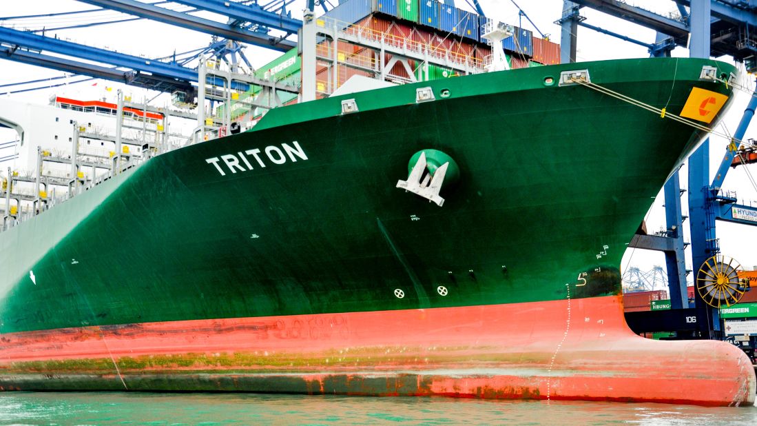 <strong>The Triton:</strong> A 1,200-foot-long, 148,000-ton container ship with a homeport of Malta, the Triton takes on cargo in the port of Hong Kong. The vessel is longer and heavier than a US Navy Nimitz-class aircraft carrier.